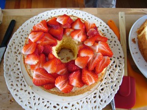 Split the layers and sandwich with strawberries